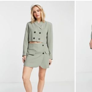 Sage button wrap miniskirt